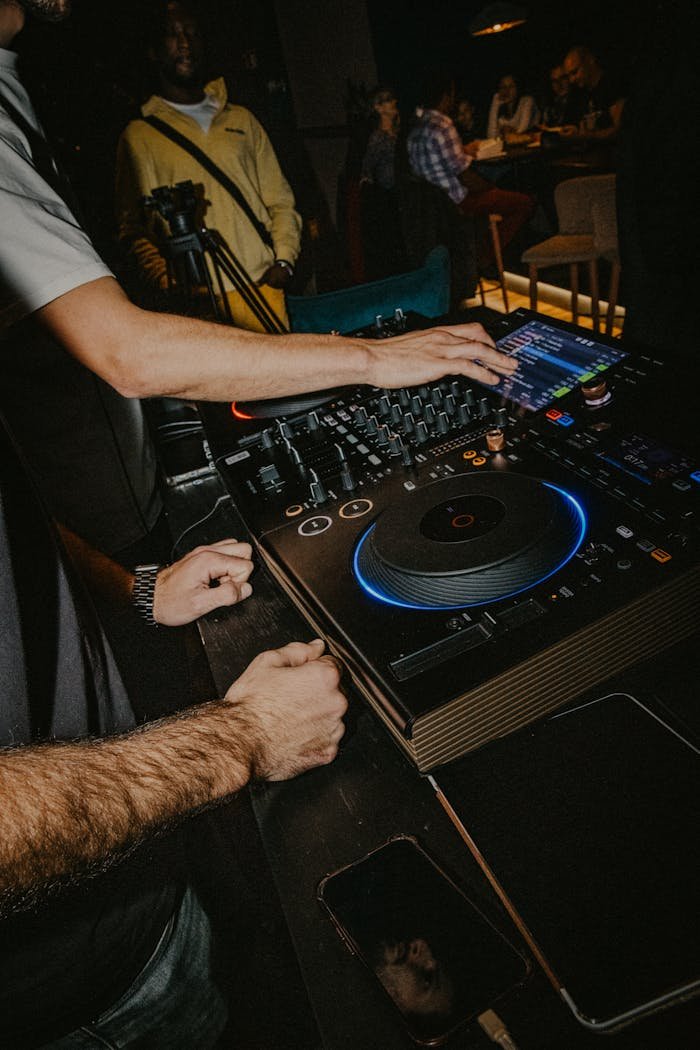 gallery-1 Live DJ performance with vibrant vibes at a Berlin nightclub, showcasing professional DJ equipment.